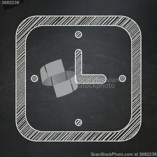 Image of Time concept: Watch on chalkboard background