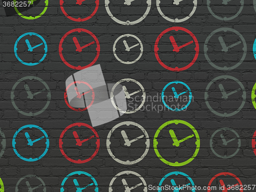 Image of Time concept: Clock icons on wall background
