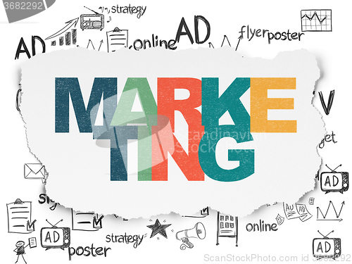 Image of Advertising concept: Marketing on Torn Paper background