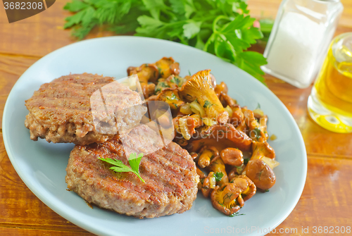 Image of burgers with fried mushrooms