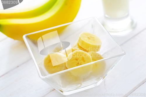 Image of Fresh banana in the glass bowl, banana and milk