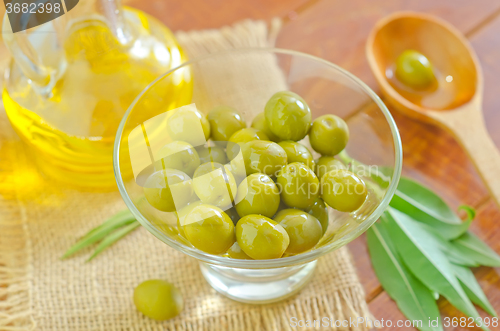 Image of green olives and oil