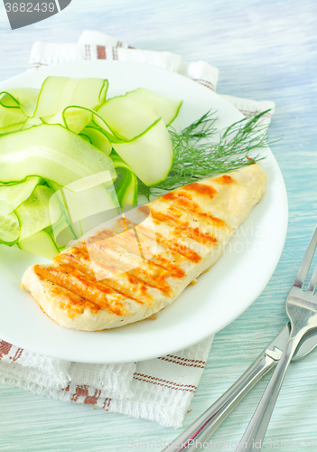 Image of chicken fillet with cucumber salad