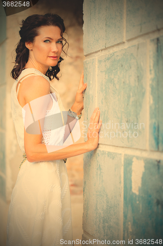 Image of beautiful woman in a white dress