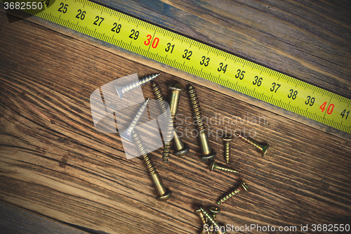 Image of screws and measuring tape