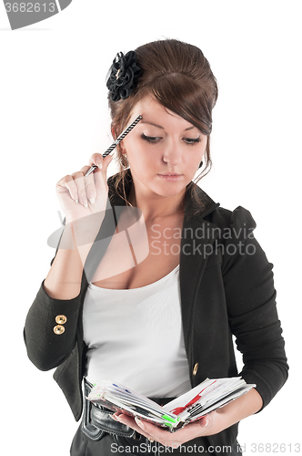 Image of portrait of a business woman with organizer