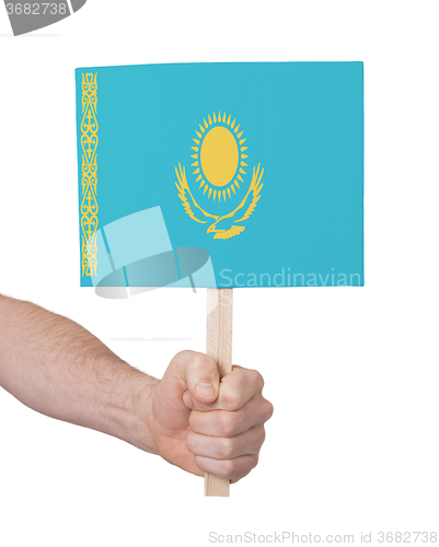 Image of Hand holding small card - Flag of Kazakhstan