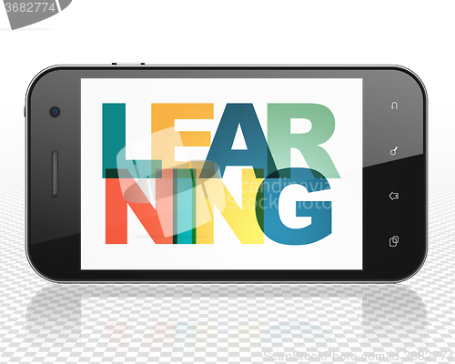 Image of Studying concept: Smartphone with Learning on  display