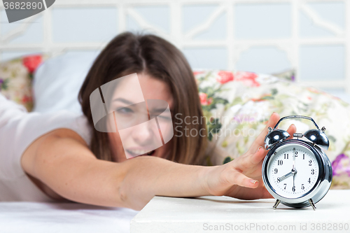 Image of The young girl in bed