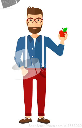 Image of Man holding apple.