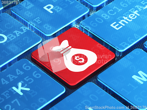 Image of Finance concept: Money Bag on computer keyboard background