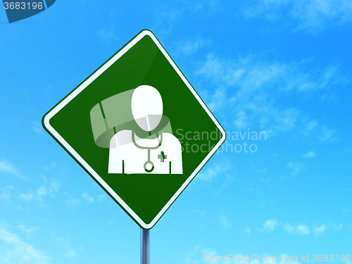 Image of Health concept: Doctor on road sign background