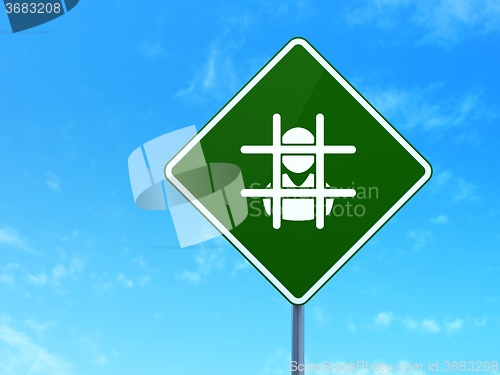 Image of Law concept: Criminal Freed on road sign background