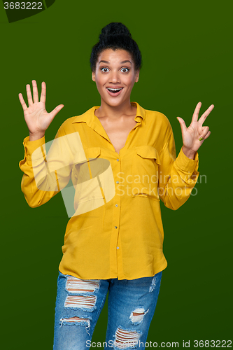 Image of Woman showing eight fingers