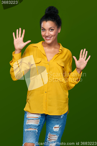 Image of Woman showing ten fingers