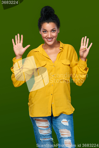 Image of Woman showing nine fingers