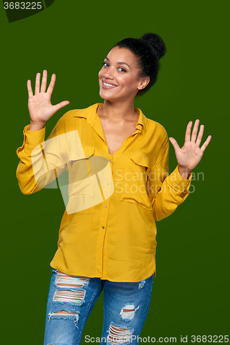 Image of Woman showing ten fingers