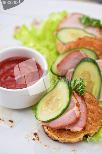 Image of pancakes with ham and cucumber 