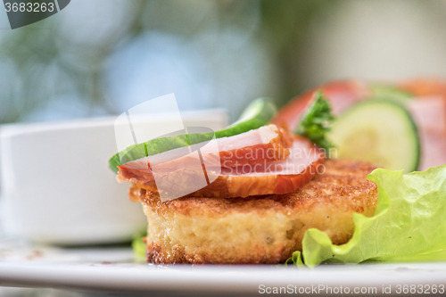 Image of pancakes with ham and cucumber 