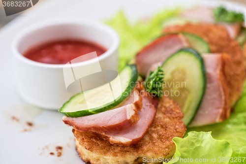 Image of pancakes with ham and cucumber 