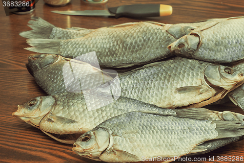 Image of Salted and dried river fish on a white background.