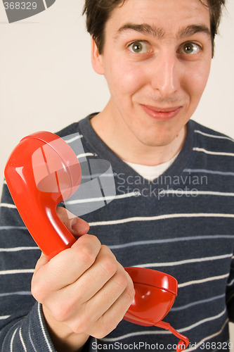 Image of red telephone receiver