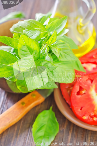 Image of tomato with basil