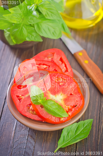 Image of tomato with basil