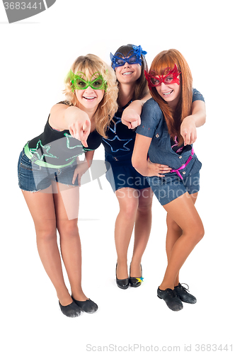 Image of  Young laughing women pointing to you