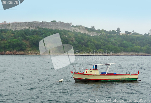 Image of small boat on the sea