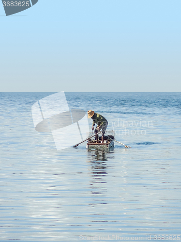 Image of fisherman on the sea