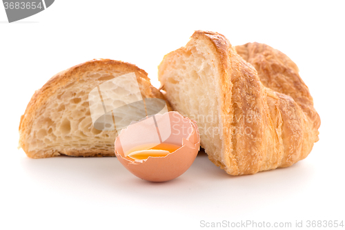 Image of Croissant and raw egg