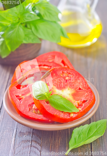 Image of tomato with basil