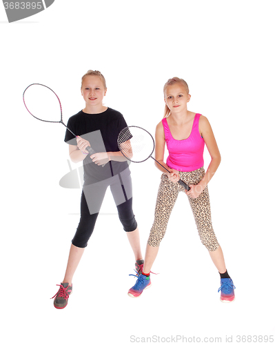 Image of Two girls with tennis racquet.