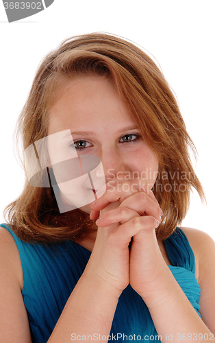 Image of Young girl praying.