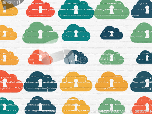 Image of Cloud networking concept: Cloud With Keyhole icons on wall background
