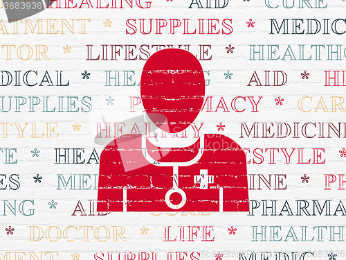Image of Health concept: Doctor on wall background