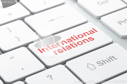 Image of Political concept: International Relations on computer keyboard background