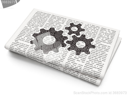 Image of Web development concept: Gears on Newspaper background