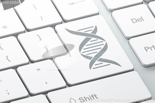 Image of Science concept: DNA on computer keyboard background