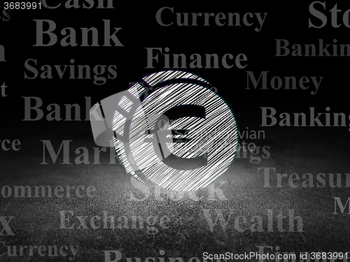 Image of Money concept: Euro Coin in grunge dark room