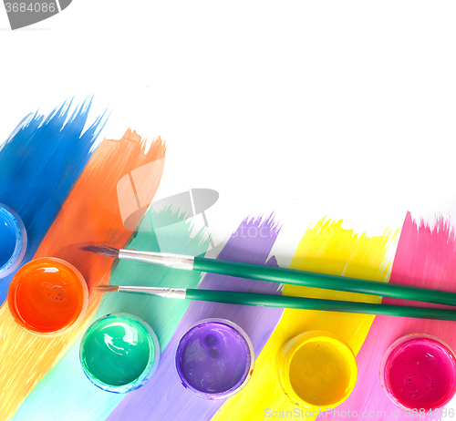 Image of Color paints and brushes isolation on white background