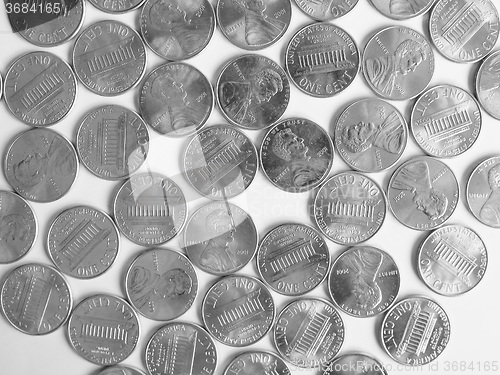 Image of Black and white Dollar coins 1 cent