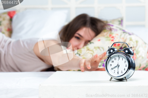 Image of The young girl in bed