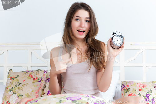 Image of The young girl in bed