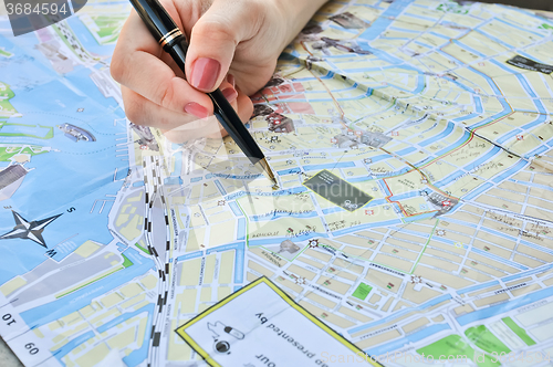 Image of notes on a map of Amsterdam