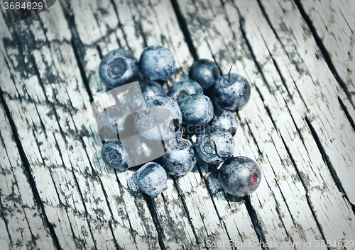 Image of Bilberries on wood