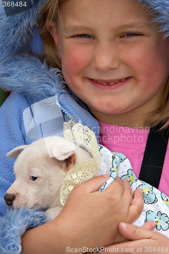 Image of girl holding pup