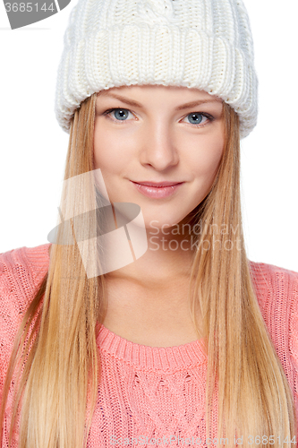 Image of Woman wearing woolen hat and sweater