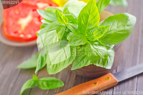 Image of tomato with basil